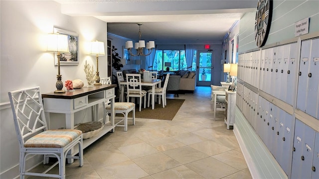 interior space with light tile patterned flooring and mail area