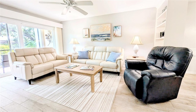 512 W Venice Ave Unit 102, Venice, FL 34285 - living room with a ceiling fan and light wood-style floors