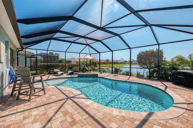 pool with a lanai, a water view, and a patio