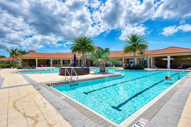 pool with a patio