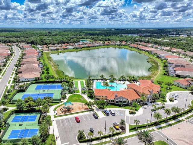 drone / aerial view with a water view