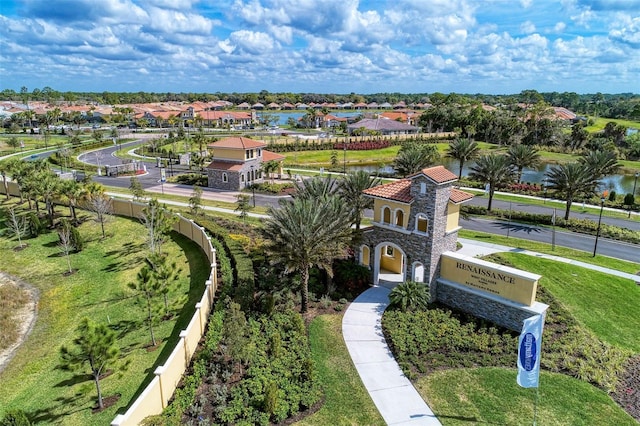 aerial view with a residential view and a water view