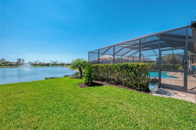 view of yard featuring an outdoor pool, a water view, and a lanai