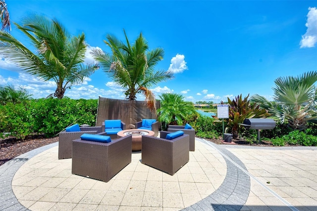 view of patio with a fire pit