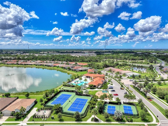 bird's eye view with a water view and a residential view