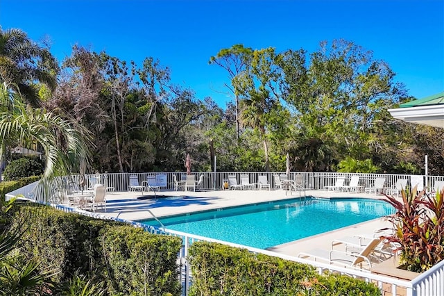 9312 Coachman Dr, Venice, FL 34293 - pool with a patio and fence