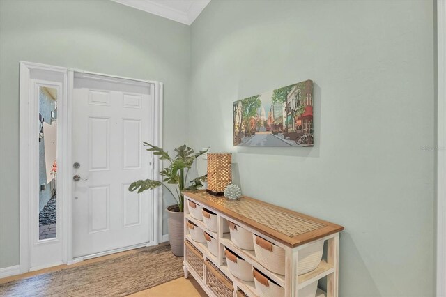 9312 Coachman Dr, Venice, FL 34293 - entrance foyer featuring ornamental molding