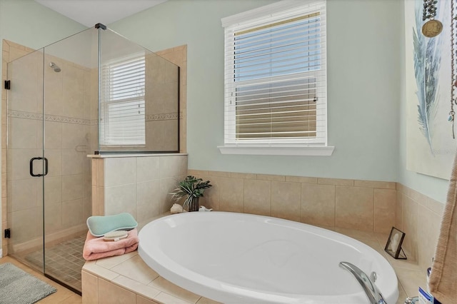 9312 Coachman Dr, Venice, FL 34293 - bathroom featuring a garden tub and a stall shower