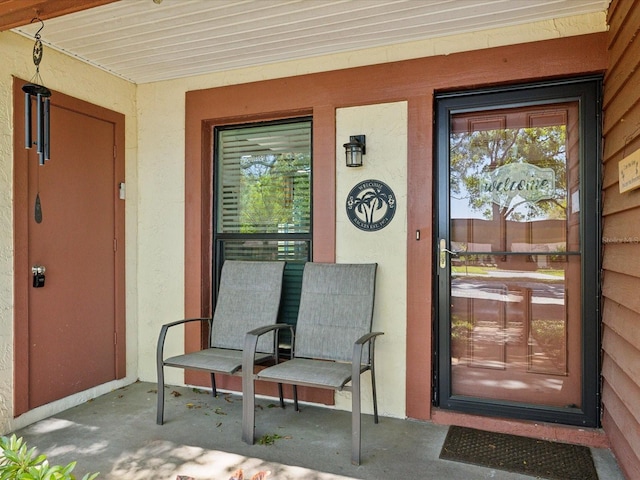 entrance to property with a porch