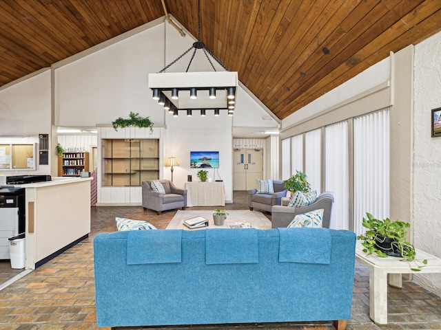 living area featuring brick floor, high vaulted ceiling, and wood ceiling