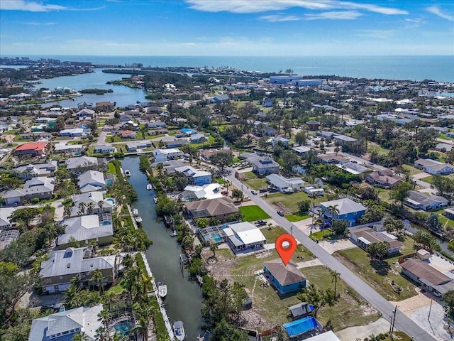 aerial view with a water view and a residential view