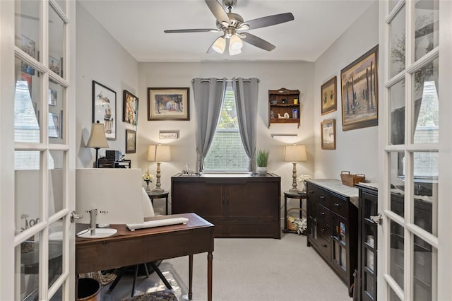 11655 Renaissance Blvd, Venice, FL 34293 - home office with french doors, a ceiling fan, and light carpet