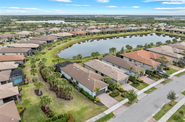 aerial view with a water view and a residential view