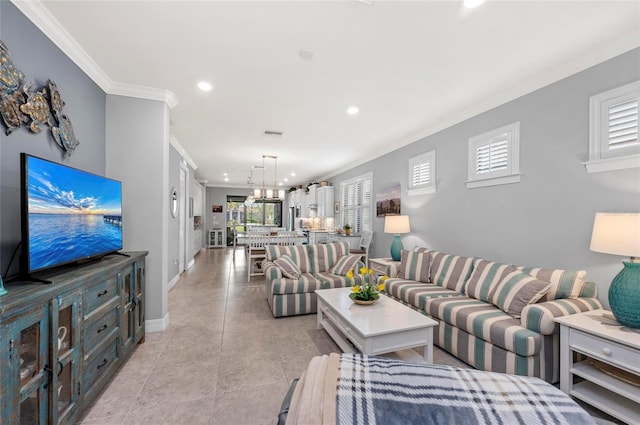 living room featuring ornamental molding, recessed lighting, and plenty of natural light