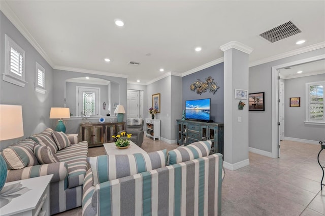 living area with recessed lighting, ornamental molding, baseboards, and visible vents