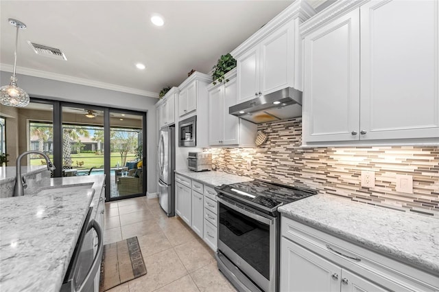 kitchen with crown molding, a sink, appliances with stainless steel finishes, under cabinet range hood, and visible vents