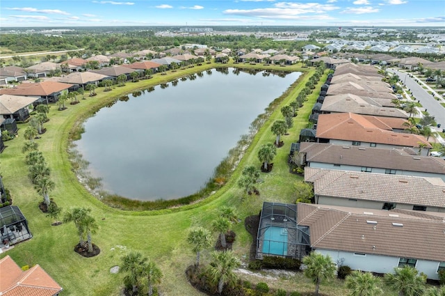 aerial view with a water view and a residential view