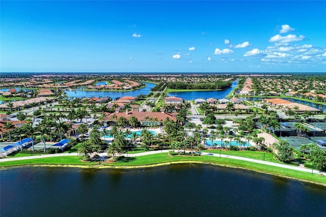 bird's eye view featuring a water view and a residential view