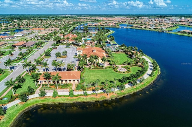 aerial view featuring a residential view and a water view