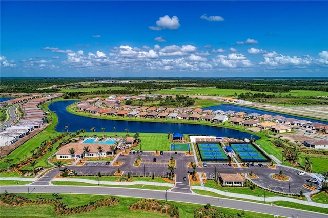bird's eye view with a residential view and a water view