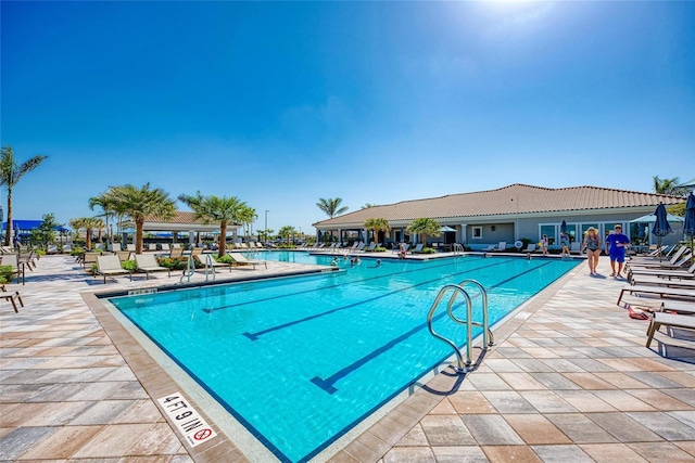 community pool with a patio