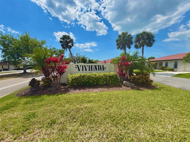 community sign with a lawn