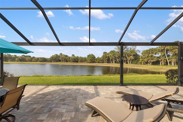 1254 Cielo Ct, North Venice, FL 34275 - view of patio / terrace featuring a lanai and a water view