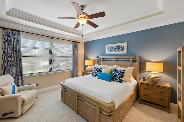 1254 Cielo Ct, North Venice, FL 34275 - bedroom featuring a ceiling fan, a tray ceiling, light colored carpet, baseboards, and ornamental molding