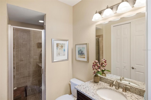 1254 Cielo Ct, North Venice, FL 34275 - bathroom with vanity, a shower stall, and toilet