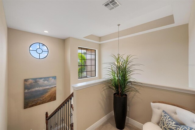 1254 Cielo Ct, North Venice, FL 34275 - sitting room featuring baseboards, recessed lighting, visible vents, carpet, and an upstairs landing