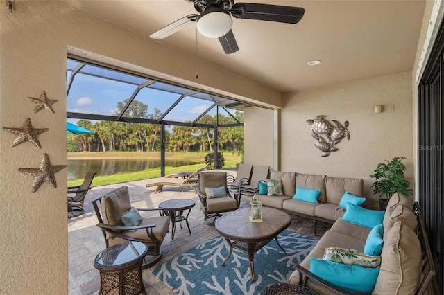 1254 Cielo Ct, North Venice, FL 34275 - view of patio / terrace with an outdoor hangout area, a lanai, a water view, and ceiling fan