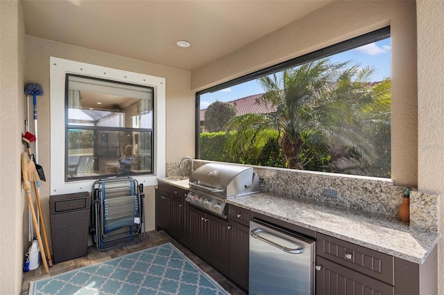 1254 Cielo Ct, North Venice, FL 34275 - view of patio / terrace featuring exterior kitchen, a sink, and a grill