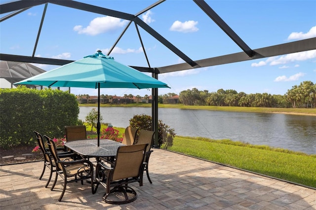 1254 Cielo Ct, North Venice, FL 34275 - view of patio featuring outdoor dining space, a lanai, and a water view