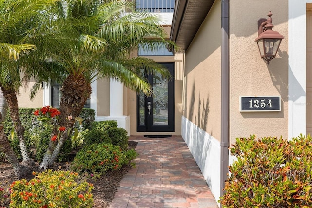 1254 Cielo Ct, North Venice, FL 34275 - property entrance featuring stucco siding