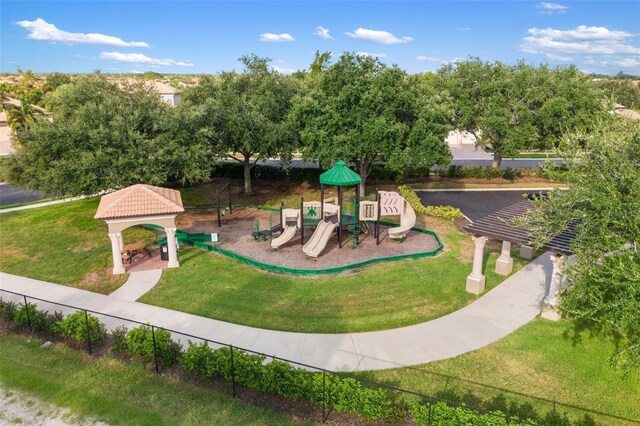 1254 Cielo Ct, North Venice, FL 34275 - communal playground featuring a lawn