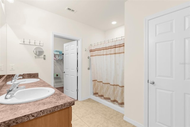 25525 Lambert Ln, Punta Gorda, FL 33950 - bathroom with visible vents, a shower with curtain, and a sink