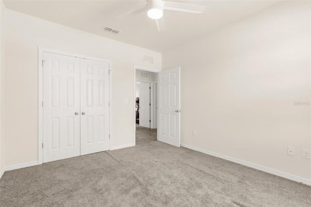 25525 Lambert Ln, Punta Gorda, FL 33950 - unfurnished bedroom with carpet, visible vents, a closet, and baseboards