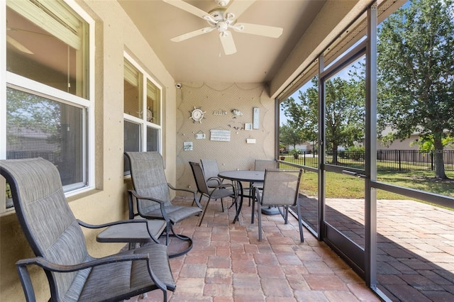 25525 Lambert Ln, Punta Gorda, FL 33950 - sunroom / solarium with ceiling fan and outdoor dining area