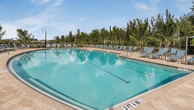 25525 Lambert Ln, Punta Gorda, FL 33950 - pool featuring a patio and fence