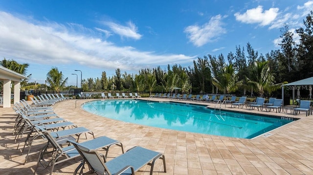 25525 Lambert Ln, Punta Gorda, FL 33950 - pool featuring fence and a patio