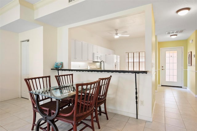 1007 Gondola Park Dr Unit 1007, Venice, FL 34292 - dining area featuring light tile patterned floors and a ceiling fan