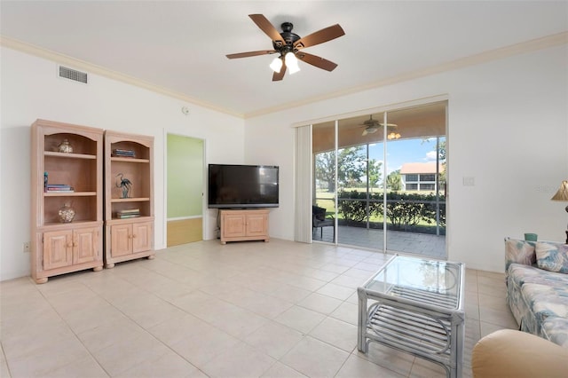 1007 Gondola Park Dr Unit 1007, Venice, FL 34292 - living room with ornamental molding, a ceiling fan, and light tile patterned floors