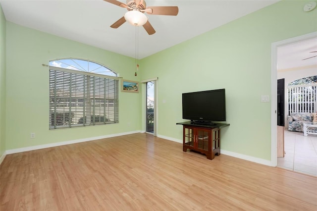 1007 Gondola Park Dr Unit 1007, Venice, FL 34292 - unfurnished living room featuring a ceiling fan and wood finished floors