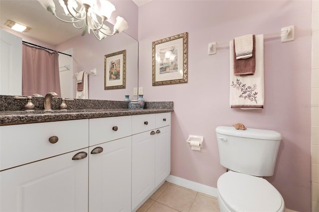 1007 Gondola Park Dr Unit 1007, Venice, FL 34292 - full bath with tile patterned floors, vanity, a chandelier, and a shower with shower curtain