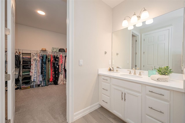 288 Soliera St, Nokomis, FL 34275 - full bathroom featuring baseboards, a spacious closet, and vanity