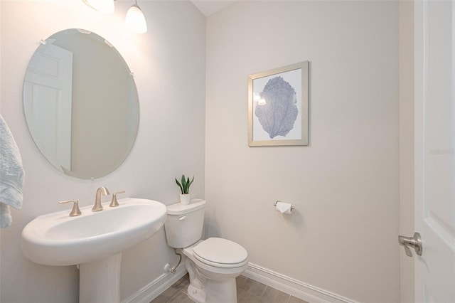 288 Soliera St, Nokomis, FL 34275 - half bath with baseboards and toilet