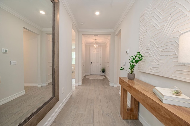 288 Soliera St, Nokomis, FL 34275 - hallway with light wood finished floors, baseboards, crown molding, and recessed lighting