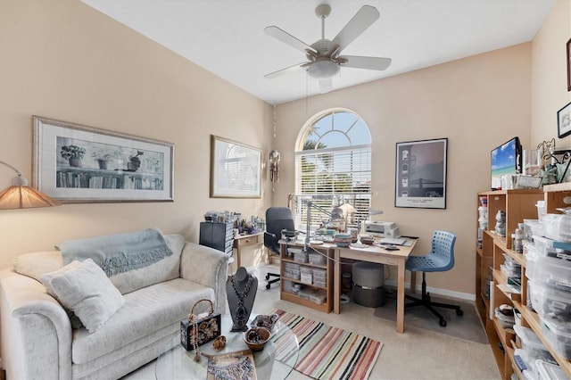 office with baseboards, ceiling fan, and carpet