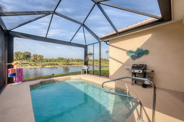 pool featuring a patio, a water view, a grill, and glass enclosure