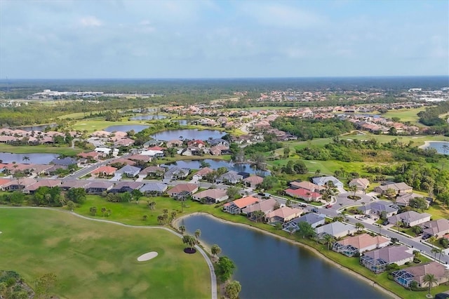 bird's eye view featuring view of golf course, a residential view, and a water view